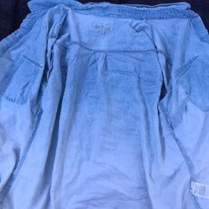 Light blue buttoned shirt